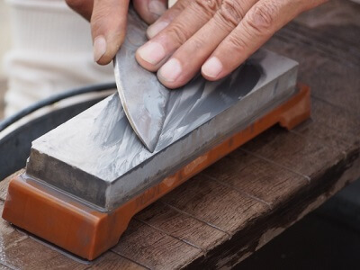 using sharpening stone