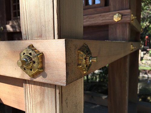 Japanese style decorative tacks and nails on pillars