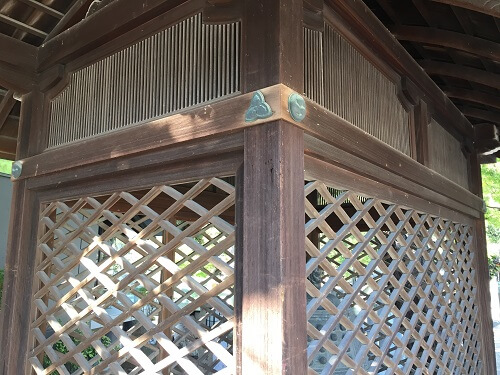 Japanese style decorative tacks and nails on small building