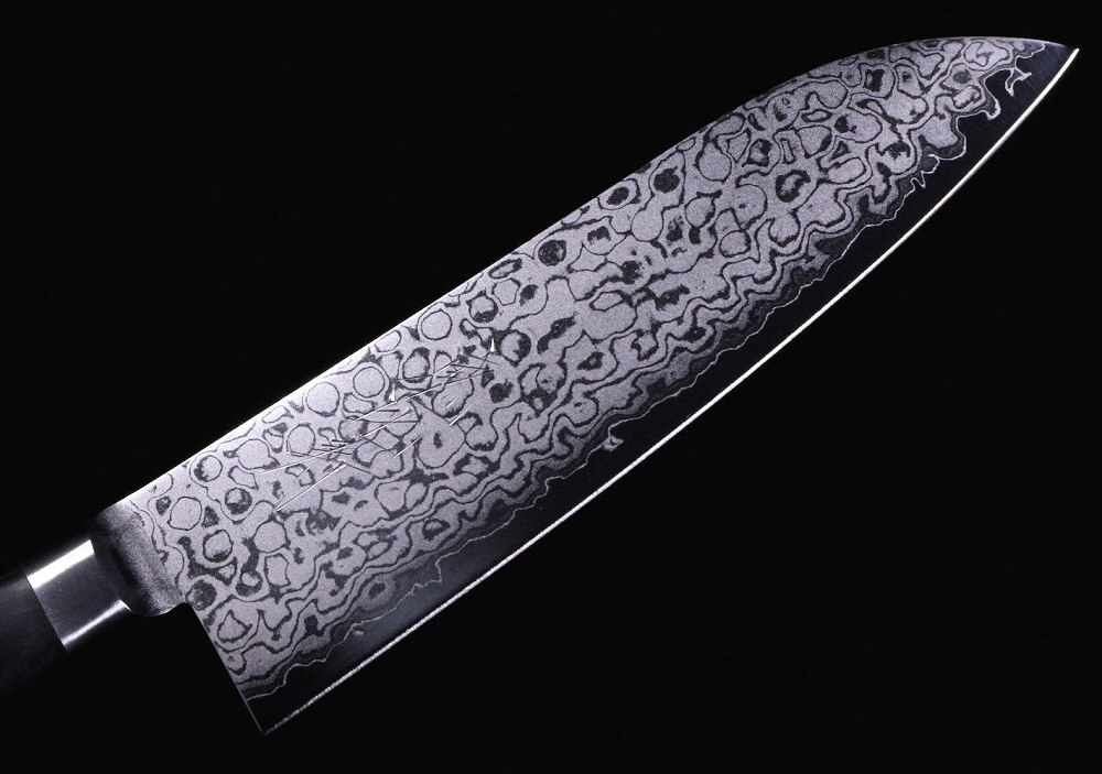 Japanese chef knife blade with damascus pattern