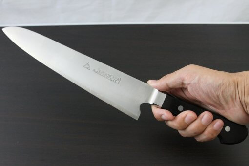 Japanese Highest Quality Chef Knife, Tohu Powder high-speed steel Series, Gyuto chef knife 270mm, grabbed by a man's hand
