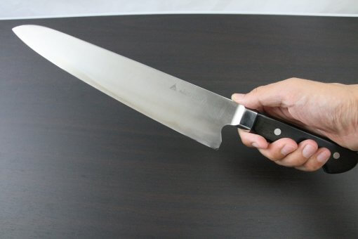 Japanese Highest Quality Chef Knife, Tohu Powder high-speed steel Series, Gyuto chef knife 300mm, grabbed by a man's hand