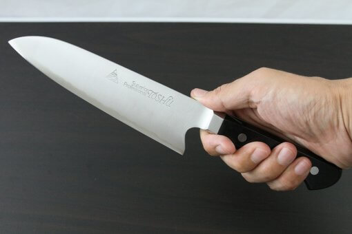 Japanese Highest Quality Chef Knife, Tohu Powder high-speed steel Series, Santoku multi-purpose knife 180mm, grabbed by a man's hand