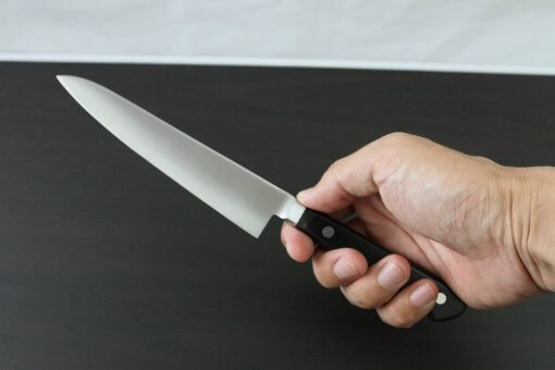 Japanese Highest Quality Chef Knife, Tohu Powder high-speed steel Series, petit knife 150mm, grabbed by a man's hand