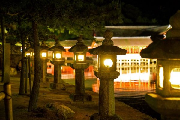 Traditional Makabe Stone Lanterns of Japan, lighted lanterns at night