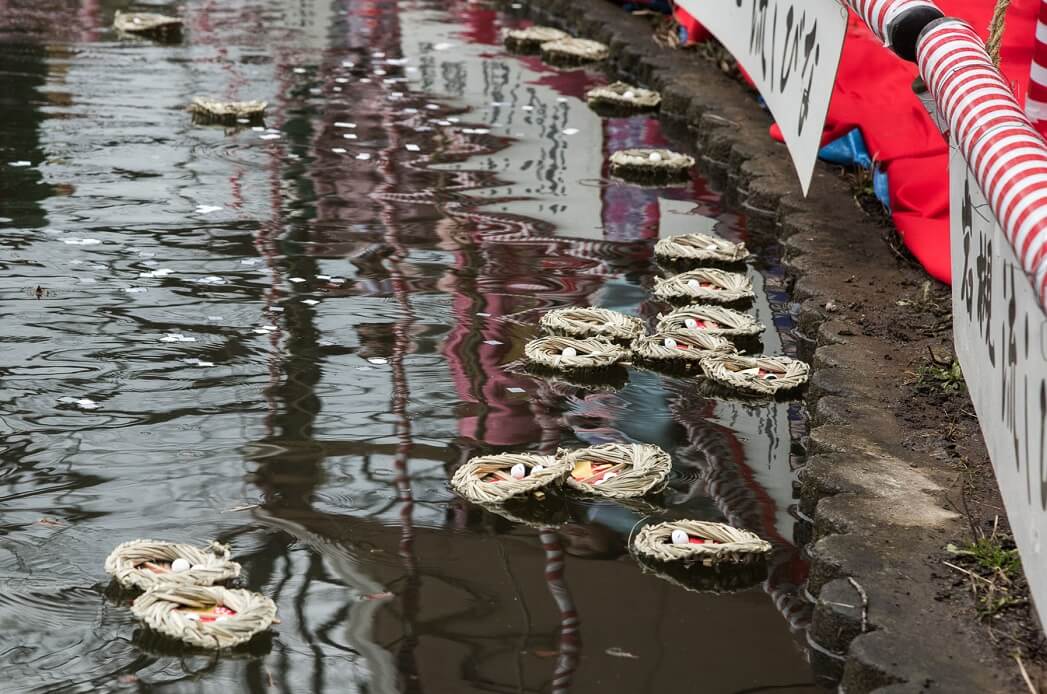 Iwatsuki Japanese dolls, a Japanese traditional crafts, thrown into the river to purify bad things of children