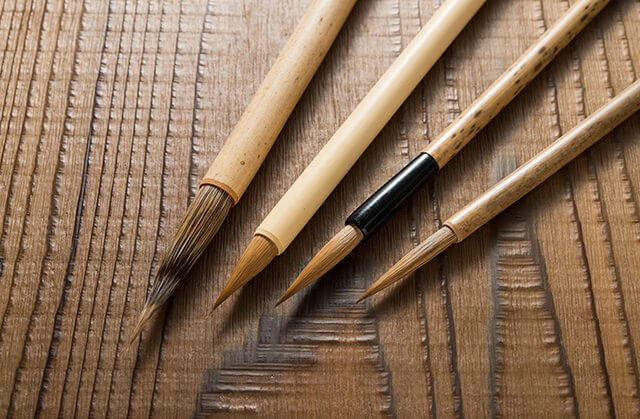 Toyohashi writing brush, a Japanese traditional craft, brushes on wood board