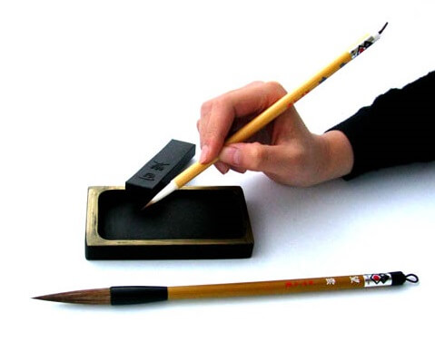 Toyohashi writing brush, a Japanese traditional craft, putting Sumi ink to write