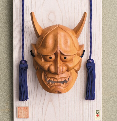 Hida Ichii one-knife carving, a Japanese traditional craft, face object of Oni daemon