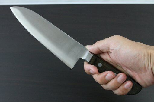 Japanese Chef Knife, Toshu super blue steel Aogami Super, Santoku multi-purpose knife 180mm, grabbed by a man's hand