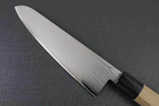 Toshu Santoku multi-purpose Japanese chef's knife, damascus blade and octagonal wood handle, details of blade backside
