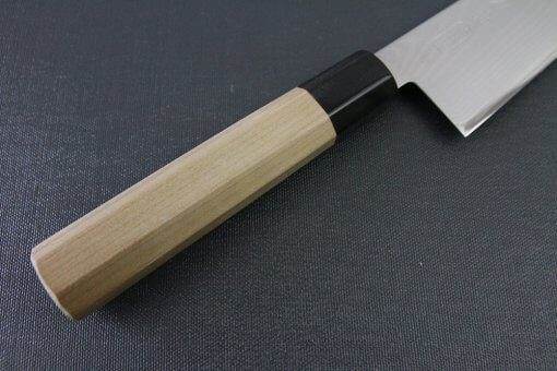Toshu Santoku multi-purpose Japanese chef's knife, damascus blade and octagonal wood handle, details of handle