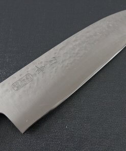 Toshu Santoku multi-purpose Japanese chef's knife, hammered finish blade and gray handle, details of blade front side