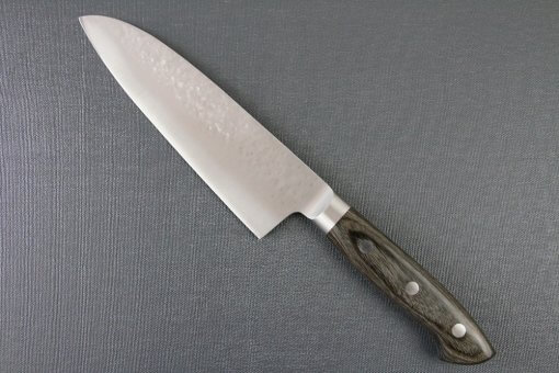 Toshu Santoku multi-purpose Japanese chef's knife, hammered finish blade and gray handle, backside entire view