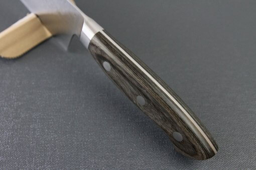 Toshu Santoku multi-purpose Japanese chef's knife, hammered finish blade and gray handle, handle top view