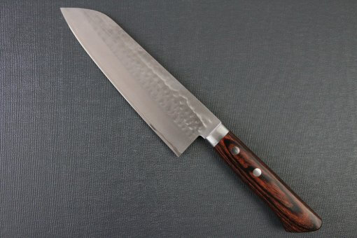 Toshu Santoku multi-purpose Japanese chef's knife, hammered finish blade and mahogany handle, backside view