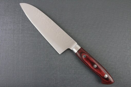 Toshu Santoku multi-purpose Japanese chef's knife, hammered finish blade and red handle, backside entire view