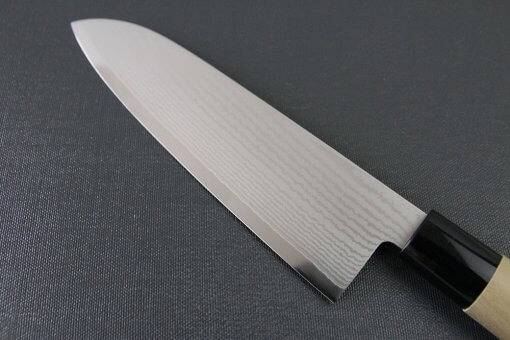 Toshu Santoku multi-purpose Japanese chef's knife, damascus blade and traditional wood handle, details of blade backside