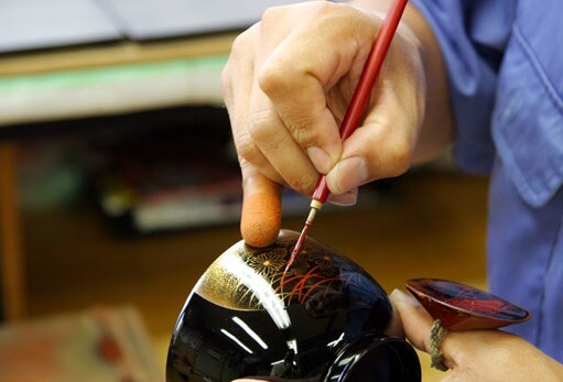 Wajima-nuri Lacquerware, a Japanese craft and art, making process of painting with gold