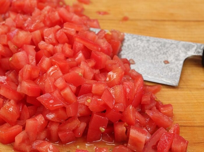 reasons to buy Japanese knives, dicing tomatoes