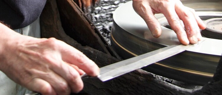 reasons to buy Japanese knives, craftsman is sharpening knife