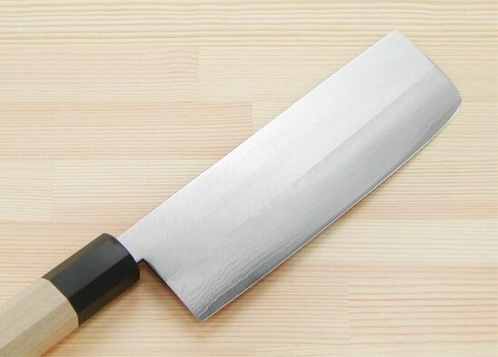 Nakiri Japanese vegetable knife, a knife on a cutting board