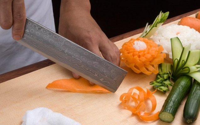 Nakiri Japanese vegetable knife, decoration cutting by a professional chef