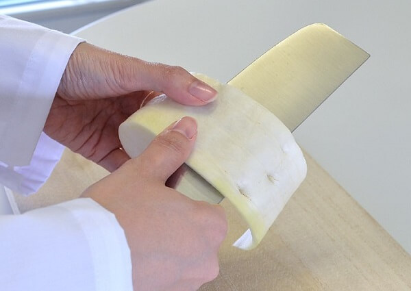 Nakiri Japanese vegetable knife, peeling root vegetable, a traditional and basic skill among Japanese chefs