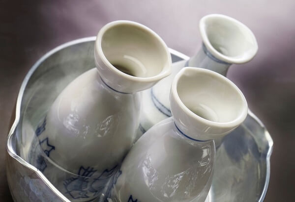 Sake is warming up in boiled water