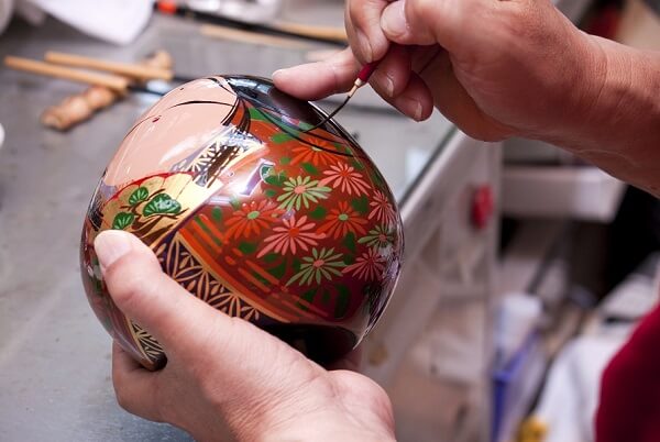 Ohuchi lacuqerware, a traditional Japanese craft, making process of drawing autumn flower pattern