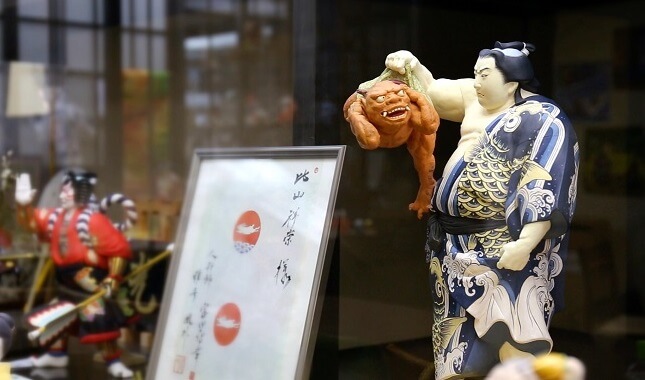 Hakata dolls, a Japanese doll craft, Sumo wrestler doll