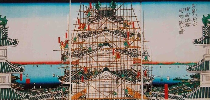 repairing Japanese castle with scaffolding by bamboo