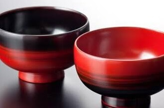 red and black Japanese lacquerware soup cups