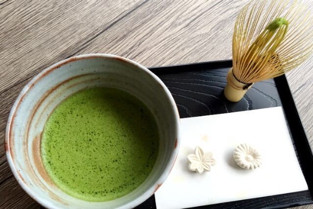 Japanese Tea ceremony, tea and sweet set on a tray